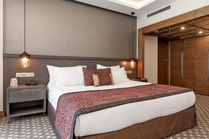 Salamis Bay Conti Resort Hotel & Casino Фамагуста Номер фото A bedroom at the hotel